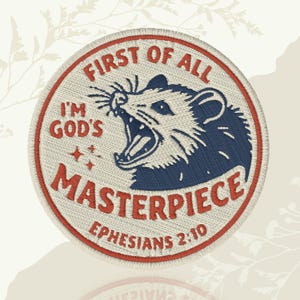 May include: Embroidered patch with a red border and text. The text reads "FIRST OF ALL I'M GOD'S MASTERPIECE EPHESIANS 2:10". A blue and white opossum is in the center, with its mouth open.