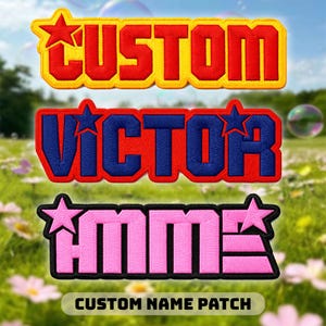 May include: Three embroidered name patches with bold block lettering and star accents. The top patch features red text on a yellow background. The middle patch has blue text on a red background. The bottom patch displays pink text on a black background.