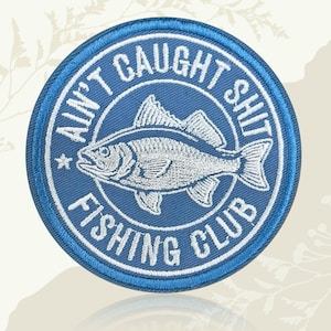 May include: A set of three ceramic nesting bowls in graduating sizes. The bowls feature a speckled, matte finish in shades of cream, light brown, and dark brown. The largest bowl measures approximately 8 inches in diameter.