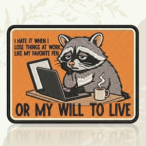 May include: Embroidered patch featuring a raccoon looking sad while working on a laptop. The text reads, "I HATE IT WHEN I LOSE THINGS AT WORK, LIKE MY FAVORITE PEN, OR MY WILL TO LIVE." The patch has an orange background.