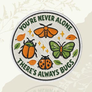 May include: Embroidered patch with the text "YOU'RE NEVER ALONE THERE'S ALWAYS BUGS". The patch features illustrations of a moth, beetle, butterfly, and ladybug in orange and green, with leaves and stars.