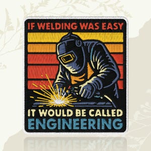 May include: Embroidered patch with a welder in a helmet, sparks emitting. The background has yellow, orange, and red stripes. Text reads: "IF WELDING WAS EASY IT WOULD BE CALLED ENGINEERING."