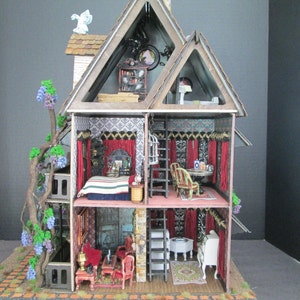 May include: A dollhouse with a whimsical design, featuring a wooden frame, a red roof, and a vine growing up the side. The interior is decorated with red curtains, a patterned wallpaper, and furniture. The dollhouse is open to reveal the interior rooms.
