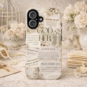 May include: A phone case with a floral and text design. The case features the words "GOD IS WITHIN HER DAUGHTER OF THE MOST HIGH" and Bible verses. The case is white with beige floral accents.