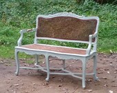 Painted caned French settee in celery green