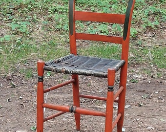 Paint decorated country ladder back chair
