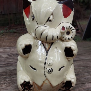 Angry elephant McCoy Pottery cookie jar 1950s