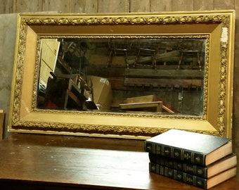 Mirror with Deep cove gilt long 19th or early 20th