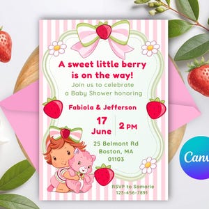 May include: Baby shower invitation with a strawberry theme. The invitation features a cartoon strawberry girl holding a pink teddy bear. The text reads "A sweet little berry is on the way!" with event details.