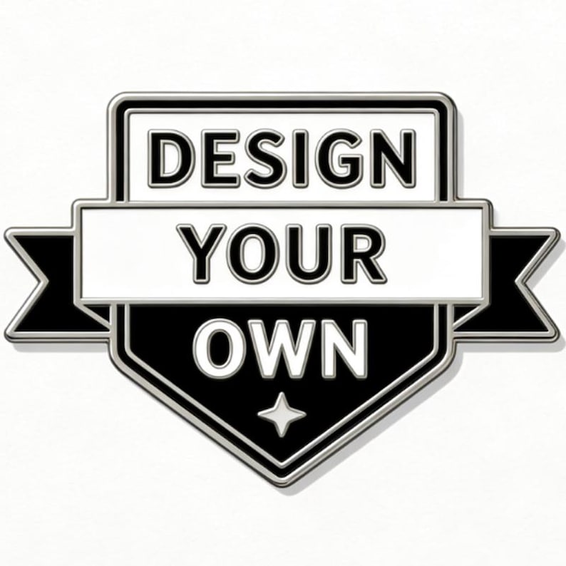 May include: A black and white badge with the text "DESIGN YOUR OWN". The badge has a shield shape with a star at the bottom and a banner across the middle. The text is in a bold, sans-serif font.