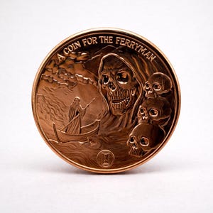 May include: A bronze coin with the inscription "A Coin for the Ferryman". The coin depicts a hooded skull, multiple smaller skulls, and a figure in a boat on a river. An hourglass symbol is at the bottom.