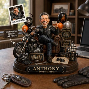 May include: A detailed figurine of a man seated on a motorcycle, holding a glass of whiskey. The base includes a sign that reads "ANTHONY - BORN TO RIDE." Additional elements include a helmet, gloves, and balloons. The text "YOUR PHOTO" and "CUSTOM MOTORCYCLE GIFT FROM YOUR PHOTO" are also visible.