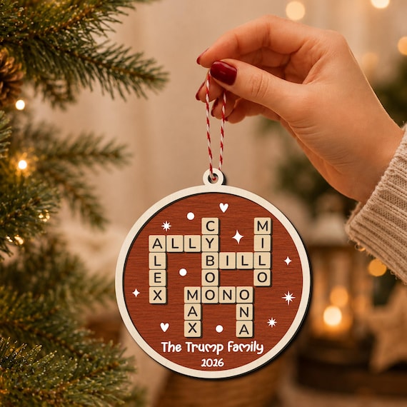 Your family members' names woven into a crossword puzzle grid on a wooden ornament — a clever, puzzle-lover twist on the 'family name' keepsake that actually makes you look twice.