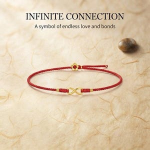 May include: A red cord bracelet featuring a gold infinity symbol and a small gold flower charm. The text INFINITE CONNECTION and A symbol of endless love and bonds is printed above the bracelet. The design includes gold accents on the cord.