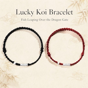 May include: Two braided cord bracelets, one black and one red, each featuring a silver-toned cylindrical bead engraved with a fish motif. The text Lucky Koi Bracelet Fish Leaping Over the Dragon Gate is displayed above the two circular bracelets.