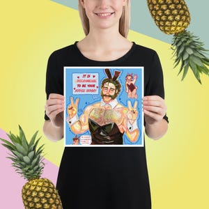 May include: A square print featuring a cartoon illustration of a muscular man in a bunny costume, with the text "IT IS PHENOMENAL TO BE YOUR SUPER BUNNY!" The artwork is set against a light blue background.