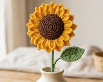 Schema per girasole all'uncinetto, fiore amigurumi con foglie