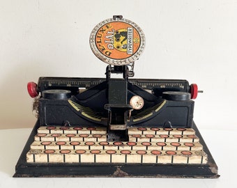 Vintage De-Luxe Dial Typewriter Tin Toy