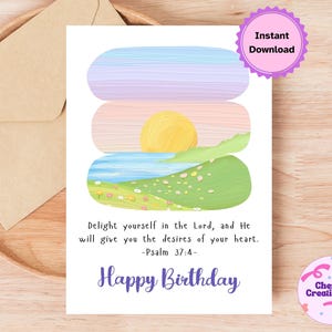 May include: A white greeting card featuring a painted landscape with a yellow sun, blue water, and green hills with small flowers. The text reads: Delight yourself in the Lord, and He will give you the desires of your heart. -Psalm 37:4- Happy Birthday.