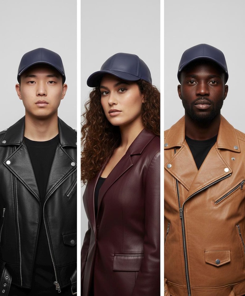 May include: Navy blue baseball cap with a curved brim. The cap is made of a smooth material and has a structured design. The cap is worn by three people, each wearing a different leather jacket.