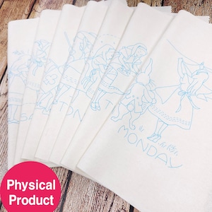 May include: White fabric napkins featuring light blue illustrations of Alice in Wonderland characters and scenes. Each napkin is printed with a different day of the week, such as "Monday".