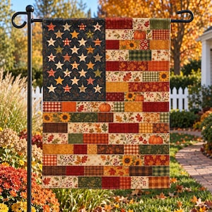 May include: A rectangular garden flag featuring a patchwork design of the American flag. The canton displays stars on a dark background, while the stripes are composed of alternating blocks of autumn-themed patterns, including pumpkins, sunflowers, and leaves.
