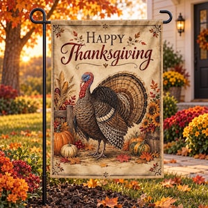 May include: A rectangular garden flag featuring the text Happy Thanksgiving in brown script. The design displays a turkey standing near pumpkins, corn, and sunflowers on a beige background, all suspended from a black metal stand.