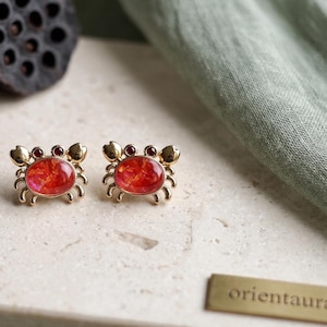 Boucles d'oreilles incrustées de coquilles de crabe anciennes | Clous d'oreilles d'art traditionnel chinois de Luodian
