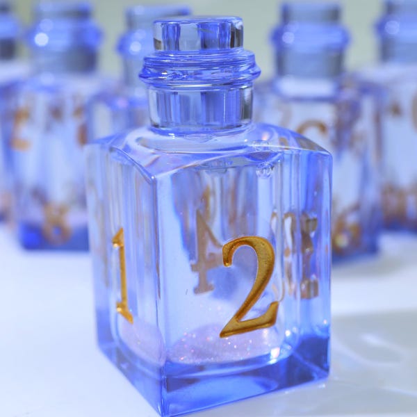 Liquid Core Resin Potion bottle dice set with golden inking DnD dice gifts for him