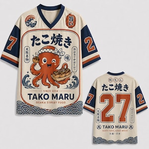 May include: A cream-colored V-neck jersey with navy blue sleeves and orange accents. The front features a cartoon octopus holding takoyaki, Japanese text, and the words TAKO MARU OSAKA STREET FOOD. The back displays the number 27 in large orange digits.