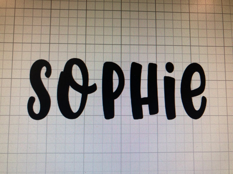 May include: Black cursive text spelling out the name "Sophie". The letters are bold and stand out against a grid background. The design is simple and modern, suitable for various applications.