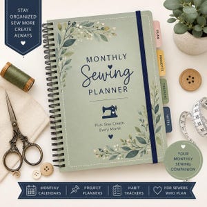 May include: A sage green spiral-bound monthly sewing planner with a dark blue elastic band. The cover features botanical illustrations, a sewing machine icon, and the text: Monthly Sewing Planner, Plan. Sew. Create. Every Month. Includes tabbed sections.