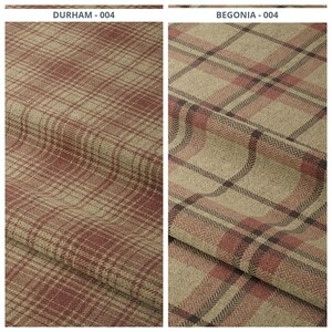 May include: Two fabric samples with plaid patterns. The left sample, labeled "DURHAM - 004", features a red and tan plaid. The right sample, labeled "BEGONIA - 004", has a similar pattern with a herringbone weave and darker accents.