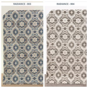 May include: Two patterned fabric panels. The left panel features a blue, tan, and brown geometric design. The right panel has a similar pattern in shades of gray and tan. The text "RADIANCE - 003" and "RADIANCE - 004" are at the top.