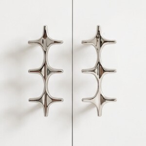 Cabinet Pulls: Polished Chrome Star Handles for Wardrobe Doors