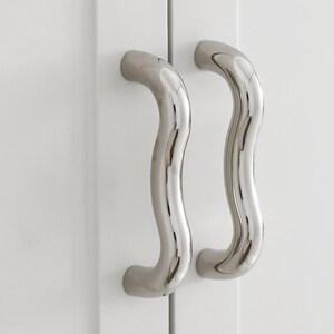Polished Chrome Cabinet Pulls: Curved Minimalist Handles for Wardrobe Doors