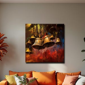 May include: A square wall art print featuring a collection of metallic bronze and gold-toned bells hanging from chains against a dark, moody background with vibrant red and orange brushstrokes, displayed in a modern living room setting.