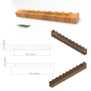 Puede incluir: Un estante de pared de madera con un borde superior ondulado y una ranura horizontal central. Los diagramas técnicos muestran una altura de 38 mm, un ancho de 254 mm, una profundidad de 23 mm y un largo de 300 mm, junto a dos tornillos.