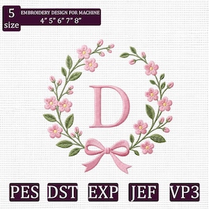 May include: An embroidery design for machine featuring a central letter D surrounded by a floral wreath of pink blossoms and green leaves, finished with a pink bow at the bottom. Text includes 5 size 4" 5" 6" 7" 8" and file formats PES DST EXP JEF VP3.