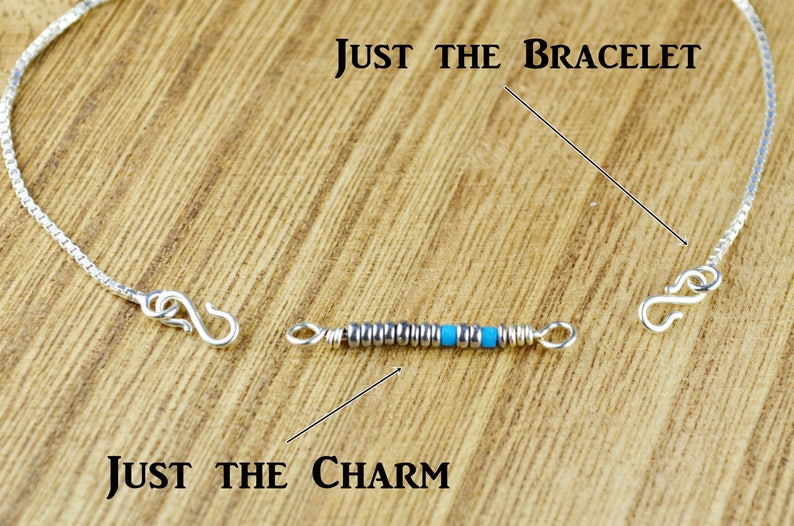 May include: A silver box chain bracelet with S-hooks at both ends and a detachable charm featuring a row of small silver and bright turquoise beads. The image includes the text Just the Bracelet and Just the Charm with pointing lines.