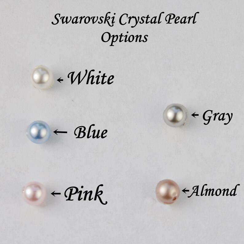 May include: Image showing Swarovski crystal pearl options in white, blue, gray, pink, and almond colors. The text "Swarovski Crystal Pearl Options" is at the top. Each pearl is labeled with its color name.
