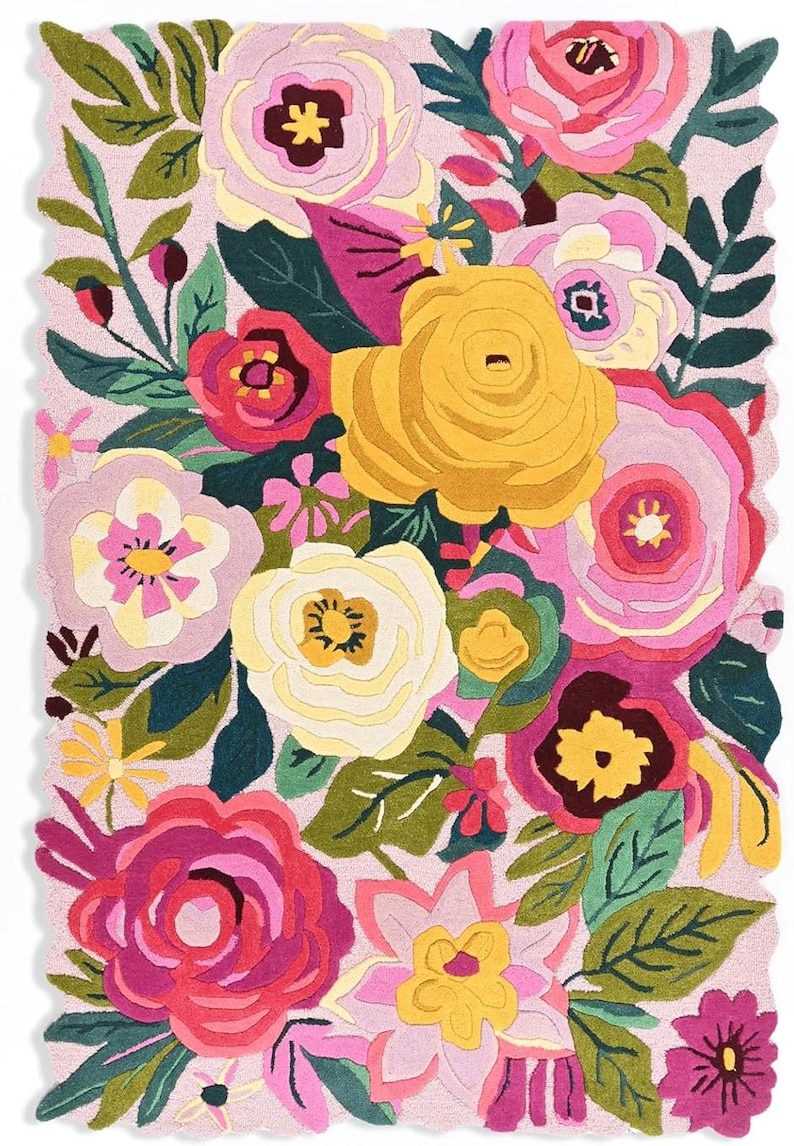 Abstract botanical floor art featuring yellow, pink, and green flowers with a premium high-density pile.
