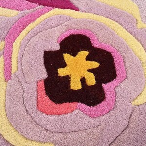 Spectacular housewarming gift idea: A vibrant handcrafted irregular floral rug that stands out in any room