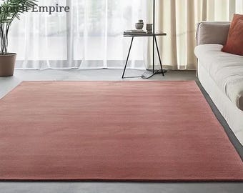 Handtuftad dusty rose ullmatta – Modern minimalistisk matta för vardagsrum