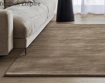 Handtuftad taupe ullmatta – Modern minimalistisk design