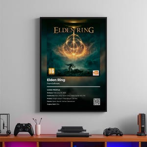 May include: A framed poster for the video game "Elden Ring." The artwork features a fiery, golden symbol over a dark landscape with a lone figure. The poster includes game details, rating, and the "Elden Ring" logo.