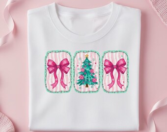 May include: White t-shirt featuring three rectangular designs. Two designs showcase pink bows with striped backgrounds, while the central design displays a Christmas tree with pink flowers and a star on top. The designs are outlined in a mint green color.