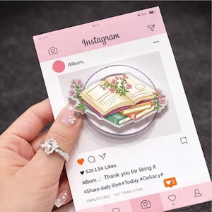 Supporto per cellulare con motivo libri impilati color pastello, accessorio floreale a tema libri (compatibile con MagSafe)