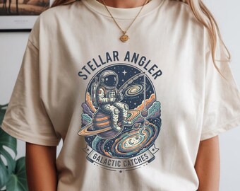 Comfort Colors Graphic T-Shirt Stellar Angler Space Tee, Astronaut Fishing Shirt, Unisex Vintage Cosmic Galaxy Gift