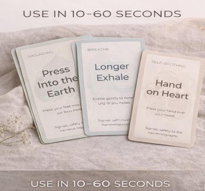 May include: Three cards with text, including "Press Into the Earth," "Longer Exhale," and "Hand on Heart." The cards are light-colored with a soft, blurred background. The text "USE IN 10-60 SECONDS" is at the top and bottom of the image.